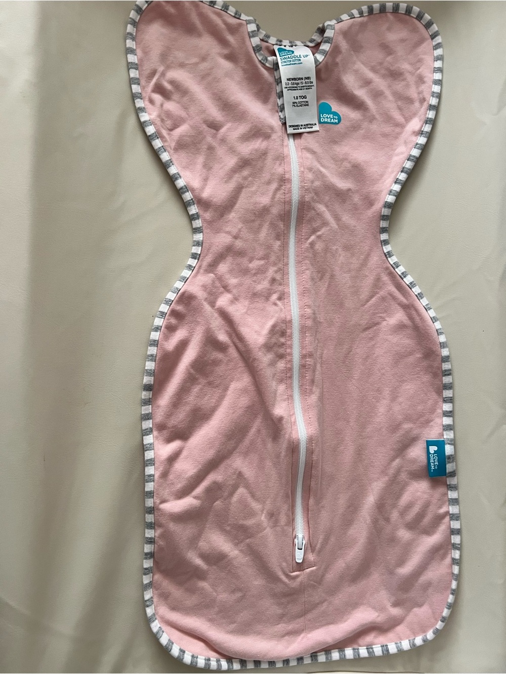 Brand new never used Love to Dream Pink Swaddle Sleep Sack with Gray-White Trim